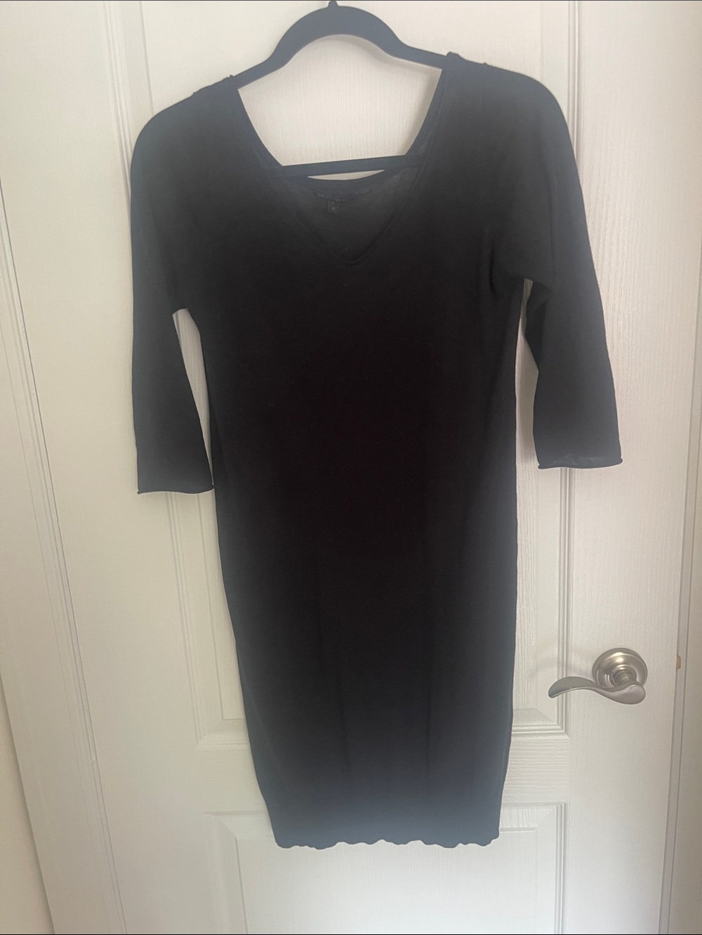 Black dress made from 100% Egyptian Cotton Mako . Three quarter sleeves .